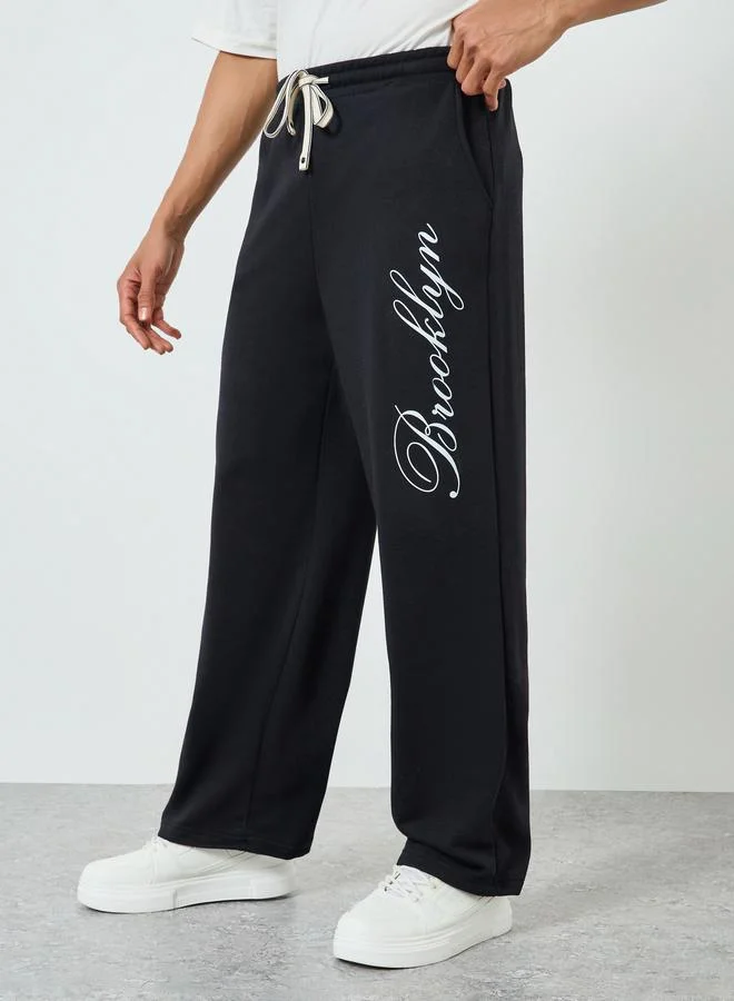 Styli Men Black Brooklyn Slogan Joggers